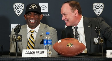 Colorado head coach Deion Sanders with athletic director Rick George