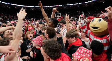 Ohio State celebrating win over No. 2 Purdue by Adam Cairns/Columbus Dispatch / USA TODAY NETWORK