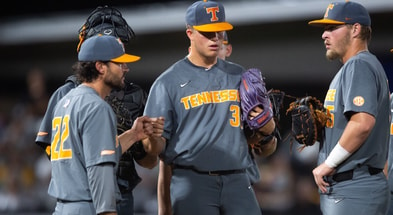 Drew Beam talks things over at the mound during Tennessee's Super Regional win at Southern Miss. Credit:  Brianna Paciorka/News Sentinel / USA TODAY NETWORK