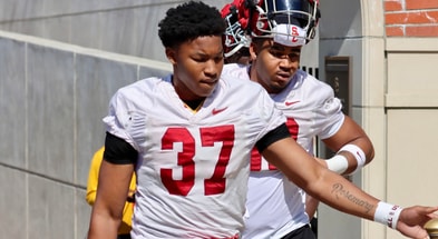 USC true freshman defensive end Lorenzo Cowan walks out to a spring ball practice with the Trojans