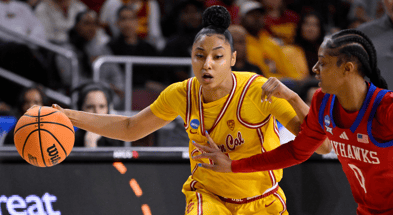 USC Trojans guard JuJu Watkins (12) drives to the basket as Kansas Jayhawks guard Wyvette Mayberry (0) defends during an NCAA Women’s Tournament 2nd round game