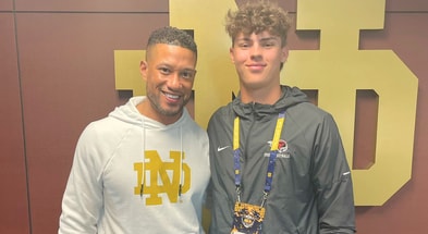 Notre Dame coach Marcus Freeman (left) with 2025 LB Anthony Sacca (right) — Credit: @saccaanthony