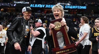 Iowa Head Coach Lisa Bluder celebrates advancing to the Final Four. (Photo by Dennis Scheidt)