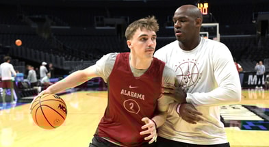 Alabama forwards Grant Nelson and Erwin Dudley
