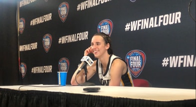 Caitlin Clark speaks with the media after the Hawkeyes win over UConn. (Photo by Kyle Huesmann)