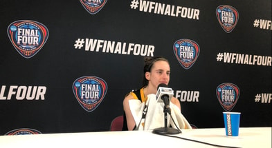 Caitlin Clark speaks with the media after the national championship game. (Photo by Kyle Huesmann)