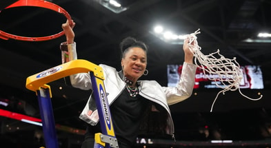 South Carolina women's basketball coach Dawn Staley cuts down the net at the Final Four (Photo: Kirby Lee - USA TODAY Sports)