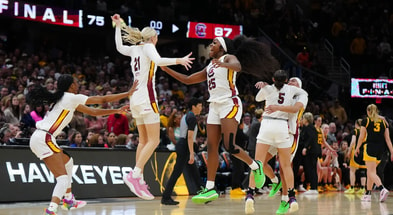 Apr 7, 2024; Cleveland, OH, USA; South Carolina Gamecocks guard Raven Johnson (25) and South Carolina Gamecocks forward Chloe Kitts (21) and guard Bree Hall (23) celebrate after defeating the Iowa Hawkeyes in the finals of the Final Four of the womens 2024 NCAA Tournament at Rocket Mortgage FieldHouse. Mandatory Credit: Kirby Lee-USA TODAY Sports