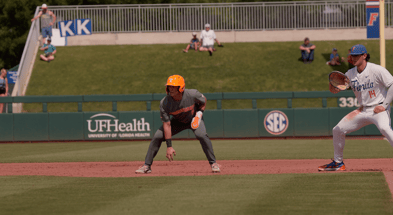 Dylan Dreiling gets a lead off first base against Florida. Credit: UT Athletics