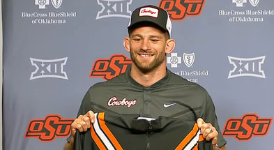 New Oklahoma State coach and Penn State product David Taylor at his introductory news conference on May 10, 2024. (Screenshot courtesy of Oklahoma State Athletics via YouTube)