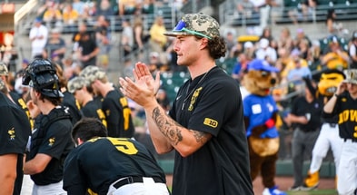 Brody Brecht cheers on his teammates in a game against FIU. (Photo by Dennis Scheidt)