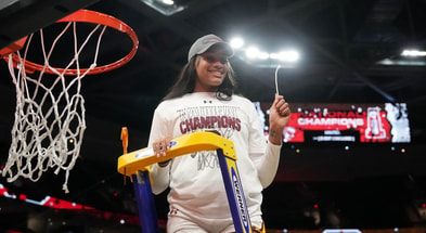South Carolina Gamecocks center Sakima Walker (35) cuts the net after defeating the Iowa Hawkeyes in the finals of the Final Four of the womens 2024 NCAA Tournament at Rocket Mortgage FieldHouse. Mandatory Credit: Kirby Lee-USA TODAY Sports