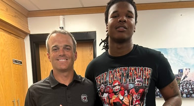 South Carolina football commitment Caleb Williams is pictured with head coach Shane Beamer (Photo Credit: Caleb Williams| X)
