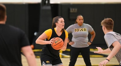 Freshman guard Taylor Stremlow handles the ball during practice on July 11th. (Photo by Dennis Scheidt)