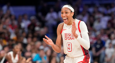 United States forward A'Ja Wilson (9) celebrates during the first half against Japan during the Paris 2024 Olympic Summer Games at Stade Pierre-Mauroy. Mandatory Credit: John David Mercer-USA TODAY Sports