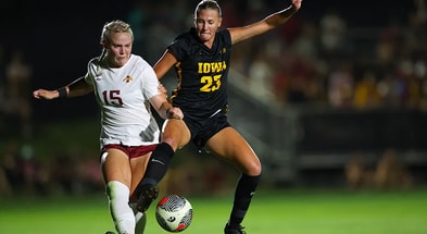 Iowa forward Elle Otto battles for a ball against rival Iowa State. (Photo by Jerod Ringwold/UI Athletics)