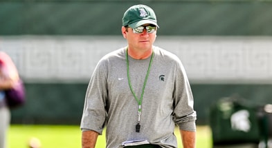 Michigan State's head coach Jonathan Smith looks on during the first day of football camp on Tuesday, July 30, 2024, in East Lansing - Nick King, USA TODAY SportsMichigan State's head coach Jonathan Smith looks on during the first day of football camp on Tuesday, July 30, 2024, in East Lansing - Nick King, USA TODAY Sports