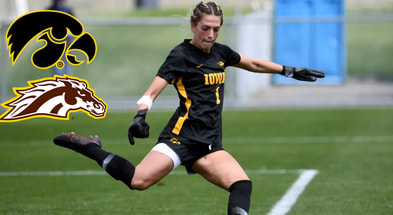 Iowa goalkeeper plays a ball in a game during the 2023 season. (Photo by UI Athletics)