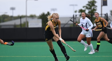 Iowa forward Dionne van Aalsum plays a ball against Northwestern. (Photo by Dennis Scheidt)