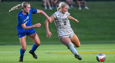 Iowa forward Berit Parten plays a ball against FGCU. (Photo by Dennis Scheidt)