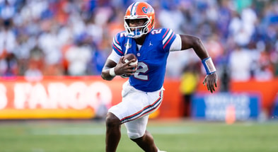 Aug 31, 2024; Gainesville, Florida, USA; Florida Gators quarterback DJ Lagway (2) runs with the ball against the Miami Hurricanes during the second half at Ben Hill Griffin Stadium. Mandatory Credit: Matt Pendleton-USA TODAY Sports