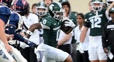 Michigan State Spartans wide receiver Alante Brown (0) runs with a punt near center field against the Florida Atlantic Owls at Spartan Stadium. - Dale Young, USA TODAY Sports