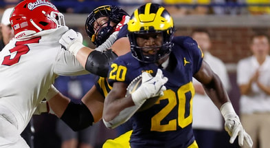 Michigan running back Kalel Mullings. © Rick Osentoski-Imagn Images