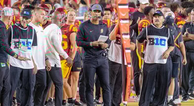USC defensive coordinator D'Anton Lynn on the sideline during a game between the Trojans and Utah State Aggies