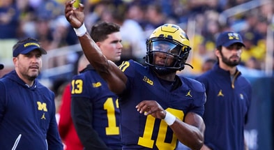 Aug 31, 2024; Ann Arbor, Michigan, USA; Michigan Wolverines quarterback Alex Orji (10) warms up before the game against the Fresno State Bulldogs at Michigan Stadium. Mandatory Credit: Rick Osentoski-USA TODAY Sports