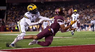 Minnesota wide receiver Daniel Jackson catches a touchdown pass against Michigan. (Photo by Minnesota Athletics)