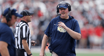 Aug 31, 2024; Columbus, Ohio, USA; Akron Zips head coach Joe Moorhead looks on during the second half against the Ohio State Buckeyes at Ohio Stadium. Mandatory Credit: Joseph Maiorana-Imagn Images