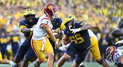 Michigan Wolverines football junior defensive tackles Kenneth Grant (left) and Mason Graham (right) each had a sack on USC quarterback Miller Moss. (Photo by Lon Horwedel / TheWolverine.com)