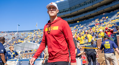USC head coach Lincoln Riley walks onto the field at Michigan State ahead of a game between the Trojans and Wolverines