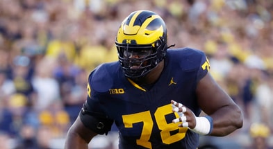 Michigan Wolverines football left tackle Myles Hinton transferred in from Stanford ahead of the 2023 season. Sherrone Moore thinks he'll play at Illinois this week. (Photo by Rick Osentoski-Imagn Images)