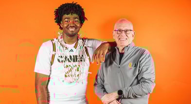 Ben Ahmed with coach L
