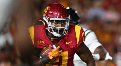 USC Trojans running back Bryan Jackson (21) runs the ball against the Utah State Aggies during the third quarter at United Airlines Field at Los Angeles Memorial Coliseum