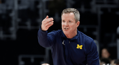 Michigan Wolverines basketball head coach Dusty May has U-M off and running in the regular season. (Photo by Rick Osentoski-Imagn Images)