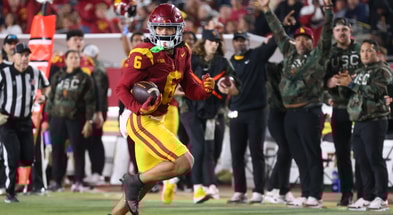USC receiver Makai Lemon runs for a touchdown during a game against the Rutgers Scarlet Knights