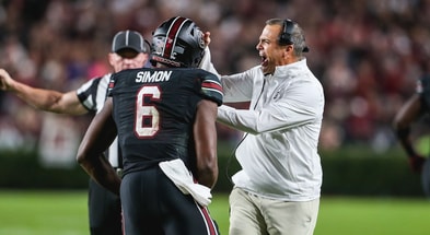 South Carolina head coach Shane Beamer celebrates with Josh Simon in the win over Texas A&M (Photo: Katie Dugan | GamecockCentral.com)