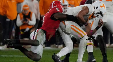 (Joshua L. Jones / USA TODAY NETWORK via Imagn Images) Georgia linebacker Smael Mondon Jr. (2) sacks Tennessee quarterback Nico Iamaleava (8) during the first half of a NCAA college football game against Tennessee in Athens, Ga., on Saturday, Nov. 16, 2024.