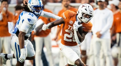 Texas Longhorns running back Quintrevion Wisner (26) carries the ball for Texas in the third quarter of the Texas Longhorns' game against the Kentucky Wildcats at Darrell K Royal Texas Memorial Stadium in Austin, Nov. 23, 2024.