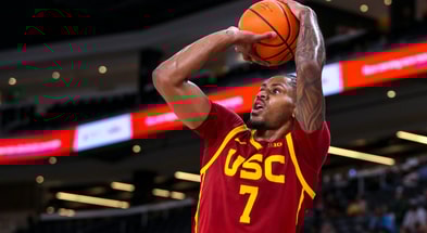 USC Trojans guard Chibuzo Agbo (7) shoots a three-pointer during the second half of their exhibition game at Acrisure Arena