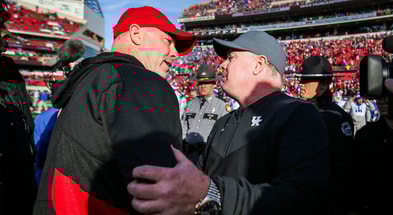 Louisville''s Jeff Brohm and Kentucky head coach Mark Stoops after the Governor's Cup,