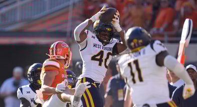 West Virginia Mountaineers linebacker Josiah Trotter (40) intercepts a pass during a college football game between the Oklahoma State Cowboys (OSU) and the West Virginia Mountaineers at Boone Pickens Stadium in Stillwater, Okla., Saturday, Oct. 5, 2024.