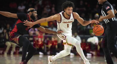 USC Trojans guard Desmond Claude (1) dribbles the ball against Cal State Northridge Matadors guard Jordan Brinson (23) in the second half at Galen Center
