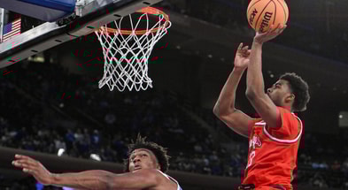 Ohio State F Sean Stewart scores over Kentucky C Amari Williams, via John Jones-Imagn Images