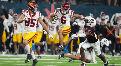 USC Trojans wide receiver Makai Lemon (6) carries the ball against Texas A&M Aggies linebacker Daymion Sanford (27) in the second half at Allegiant Stadium