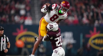 USC Trojans wide receiver Ja'Kobi Lane (8) catches the ball against Texas A&M Aggies defensive back BJ Mayes (20) in the second half at Allegiant Stadium