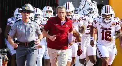 South Carolina football coach Shane Beamer leading his team out before the Citrus Bowl. Photo by: Katie Dugan | GamecockCentral