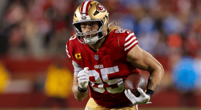 San Francisco tight end George Kittle runs after catching a pass against the Detroit Lions. (Photo by Sergio Estrada-Imagn Images)